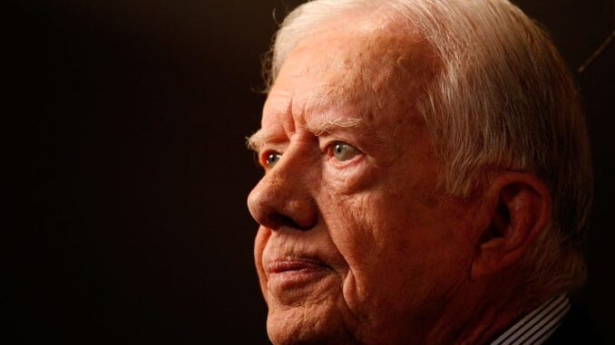 Elderly man gazing thoughtfully into distance. Elderly man gazing thoughtfully into distance.