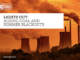 Coal plant with smoke and environmental message.