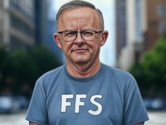 Man in glasses wearing "FFS" t-shirt.