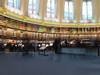 Historic library interior with arched ceiling.