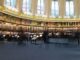 Historic library interior with arched ceiling.