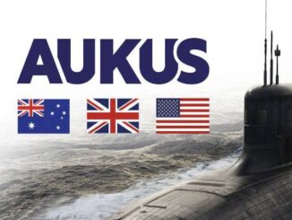 AUKUS logo with submarine and national flags.