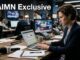 Woman reporter typing at busy newsroom desk