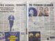 Open newspaper with articles and images displayed.