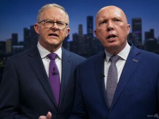 Two men in suits with city skyline.