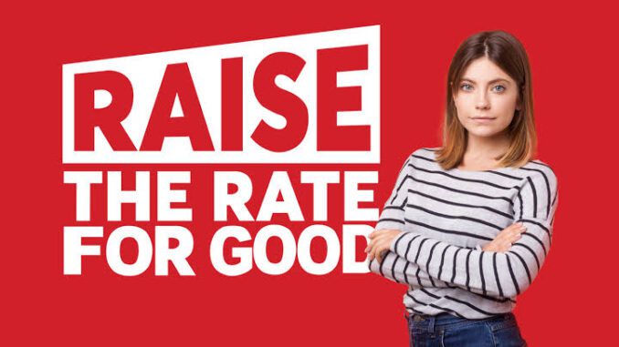 Woman beside "Raise the Rate for Good" text. Woman beside "Raise the Rate for Good" text.
