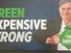 Man opening shirt revealing The Greens logo.