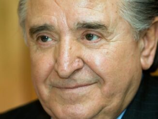Elderly man with a thoughtful expression.