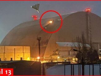 Drone over building with red circle highlight.