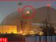 Drone over building with red circle highlight.