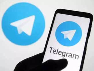Telegram app logo on phone and screen.