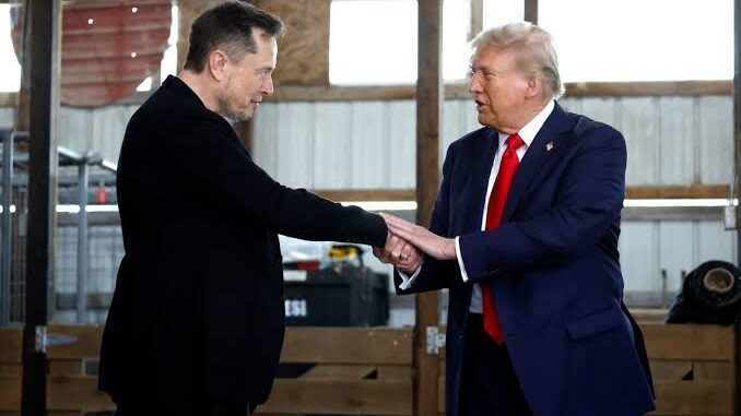 Two men shaking hands indoors. Two men shaking hands indoors.