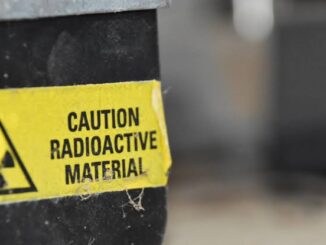 Yellow caution label for radioactive material.