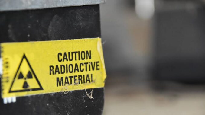 Yellow caution label for radioactive material.