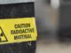Yellow caution label for radioactive material.