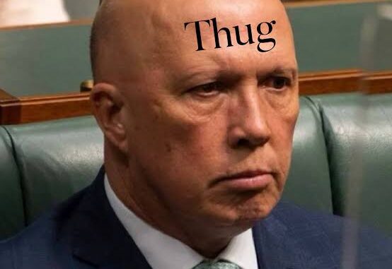Bald man with "Thug" on forehead. Bald man with "Thug" on forehead.