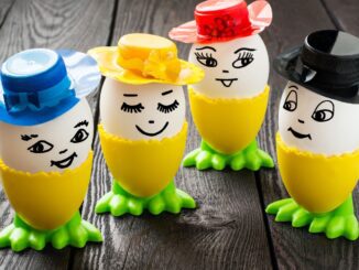 Decorated eggs with hats and faces.