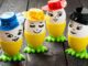 Decorated eggs with hats and faces.