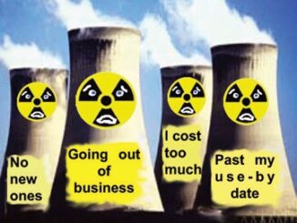 Cooling towers with warning signs and messages.