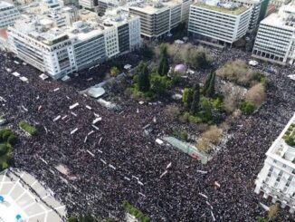 Aerial view of a large city protest.