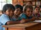 Children smiling in a classroom setting.