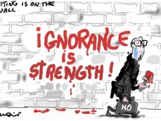 Cartoon man painting "Ignorance is Strength" graffiti.