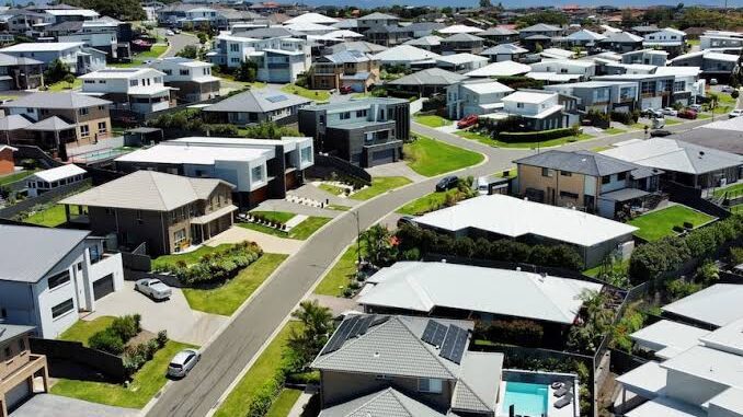 Suburban neighborhood with modern houses, aerial view. Suburban neighborhood with modern houses, aerial view.