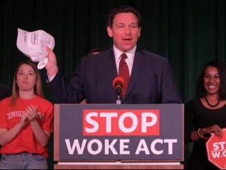 Man speaking at "Stop Woke Act" event.