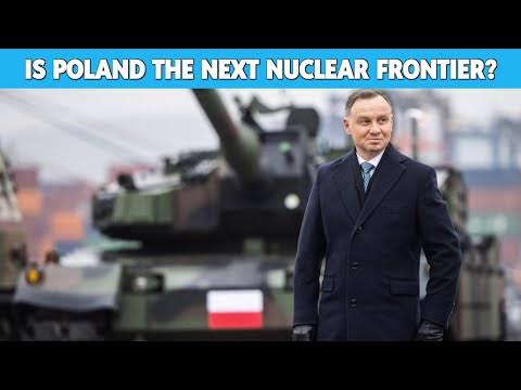 Man standing near military tank, Poland question.