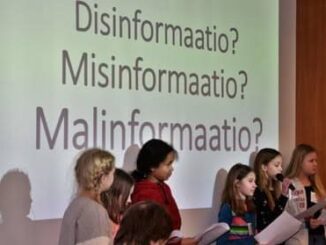 Children presenting on misinformation in Finland.