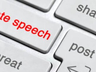 Keyboard keys labeled hate speech, share, threat.