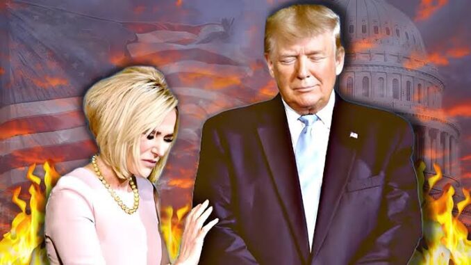 Man and woman with fiery background, Capitol visible.