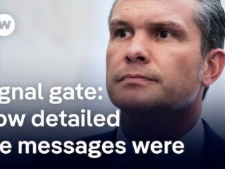 Man in suit with "Signal gate" text.
