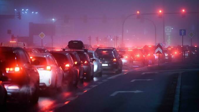 Traffic jam with cars at night.
