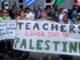 Protesters holding signs supporting Palestine teachers.