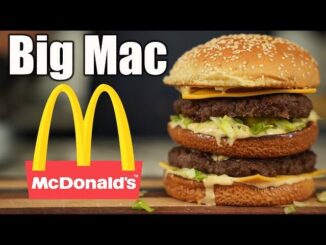 Big Mac burger with McDonald's logo.