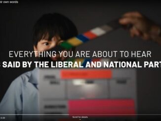 Child holding clapperboard, political message displayed.