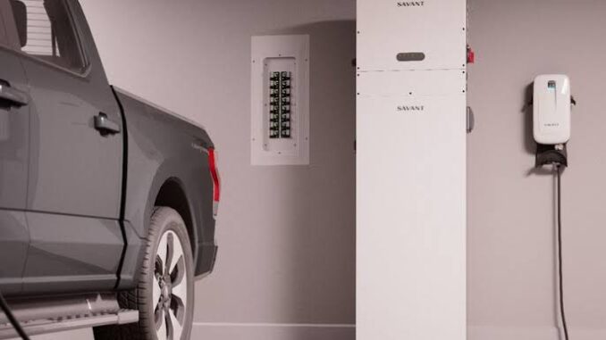 Truck charging in a garage with equipment. Truck charging in a garage with equipment.
