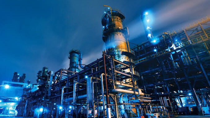 Industrial plant at night with bright lights. Industrial plant at night with bright lights.