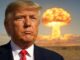 Man standing with nuclear explosion in background.