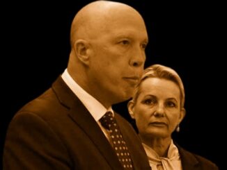 Two people in formal attire, serious expression.