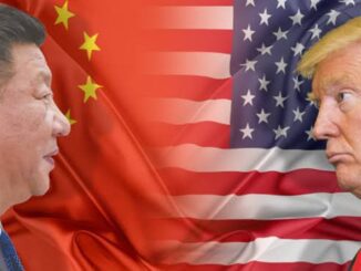 Two leaders with Chinese and American flags.