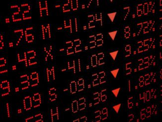 Red stock market data with downward arrows indicating losses.