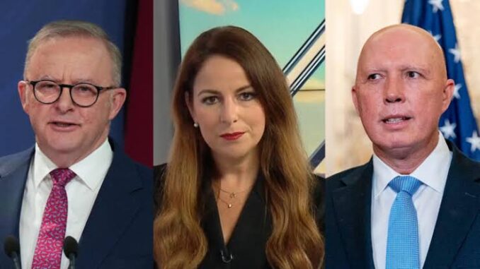 Three news anchors posing in a studio with a cityscape background. Three news anchors posing in a studio with a cityscape background.