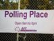 Sign indicating a polling place open from 8am to 6pm.