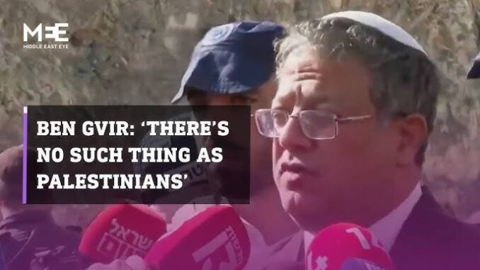A man speaks to reporters, denying any wrongdoing against Palestinians. A man speaks to reporters, denying any wrongdoing against Palestinians.