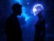 A human and a robot face each other against a cosmic background.