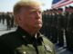 Donald Trump in military uniform at a formal event.