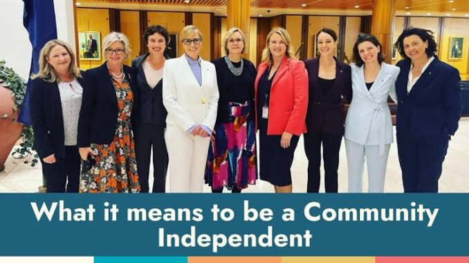 Group of professional women standing together in a conference room. Group of professional women standing together in a conference room.