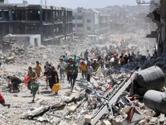 People navigate through rubble after a devastating earthquake.